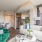 White and green furniture inside luxury Pinnacle Apartment