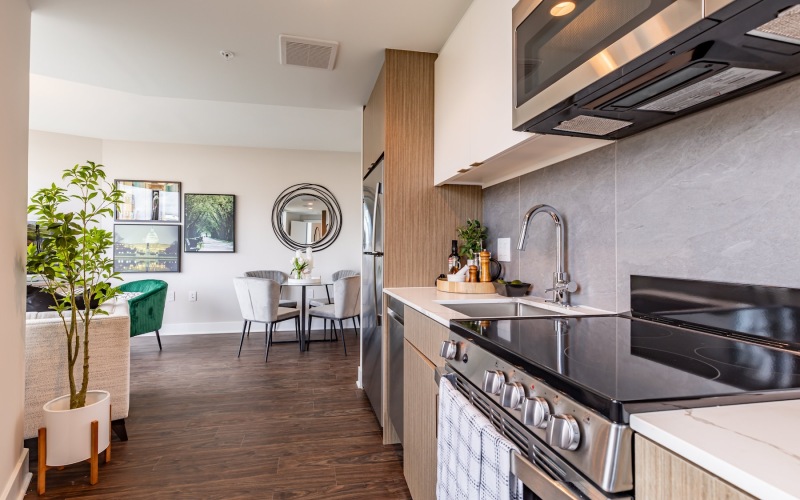 a kitchen with a microwave and stove