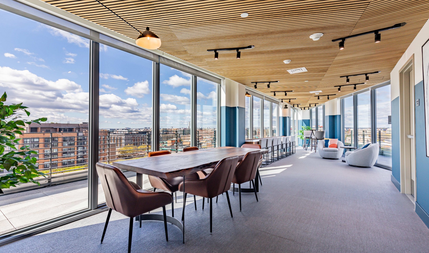 rooftop lounge with tables and chairs Pinnacle NoMa luxury apartments in DC