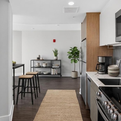 A kitchen with a microwave and stove