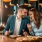 A man and woman eating pizza in NoMa local restaurant 